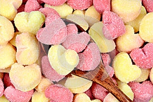 Wooden spoon on a many gnocchi hearts