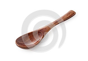 A wooden spoon placed on a white background