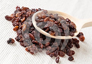 Wooden spoon with raisins