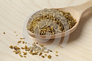 Wooden spoon with roasted Freekeh photo