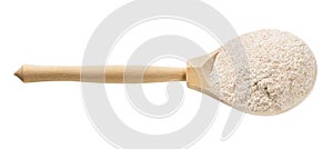 Wooden spoon with whole-grain wheat flour isolated