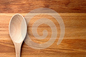 Wooden Spoon on wood cutting board