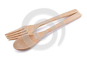 Wooden spoon and wooden fork isolated on white background