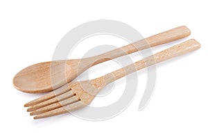 Wooden spoon and wooden fork isolated on white background