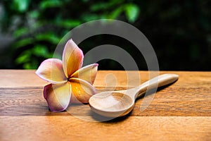 Wooden spoons and flower