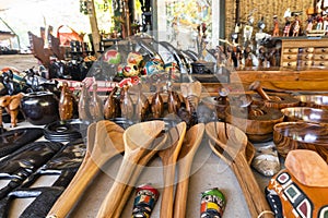 Wooden spoons and more souvenirs on traditional african market in Maputo, Mozambique