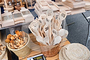 Wooden spoons and other kitchenware at holiday market in Ribnica town. Slovenia