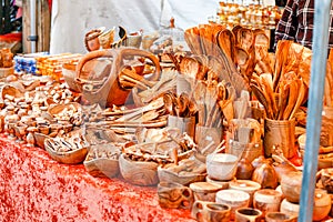 Wooden spoons and vintage kitchen utensils for sale at the market