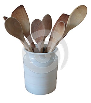 Wooden spoons in white jug