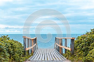 Wooden stair leading to the Sylt island beach, in North Sea, Germany