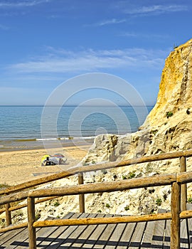 Wooden staircase at the Cliff of Asperillo in Mazagon beach, province of Huelva, Andalusia, Spain photo