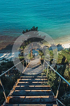 Wooden Staircase Leading To Sea Coast, In Morning Sunrise Travel Destination Vacation Concept
