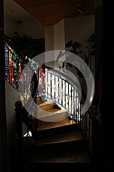 Wooden Staircase With Metal Railing