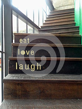 Wooden staircase with texts