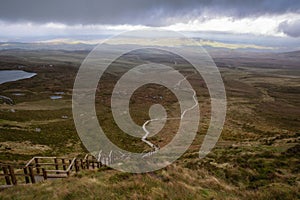 Wooden staircase up a mountain. Cuilcagh Boardwalk Trail in Fermanagh, Northern Ireland