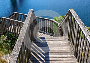 Wooden staircase by the water