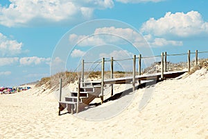 Wooden stairs access to the beach