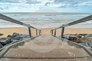 Wooden stairs of Boa Viagem beach in Recife, PE, Brazil photo