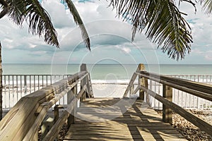 Wooden stairs on deserted beach dunes in Vero