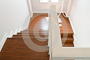 Wooden stairs with hand rail