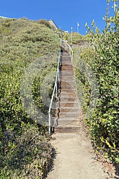 Wooden stairs with handrailing on a hill at San Clemente, California