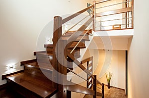 Wooden stairs at home photo