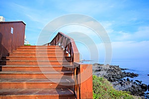 Wooden stairs next to beach