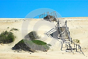 Wooden stairs over dunes