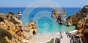 Wooden stairs to beach Praia do Camilo, Lagos, Portugal