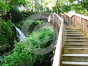 Wooden stairway near waterfalls