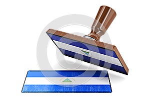 Wooden stamper, seal with Nicaraguan flag, 3D rendering