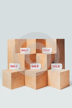 wooden stands with sale signs