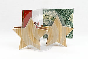 Wooden stars as Christmas decorations and napkin stands