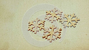 Wooden stars in retro style covered with sepia-colored texture.