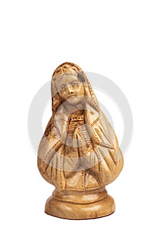 Wooden statue bas-relief of the Blessed Virgin Mary isolated on white background.