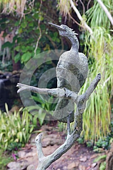 A wooden statue of bird