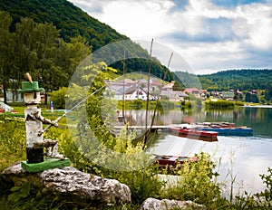 Wooden statue of a fisherman in Dedinky village, Slovakia