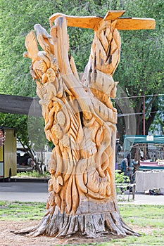 Wooden statue located in a public park Bolson, Argentina photo