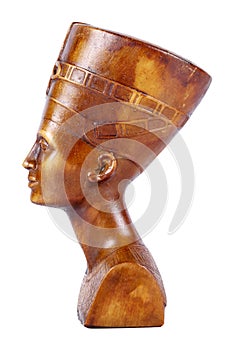 Wooden statue of pharaoh on a white background.