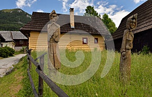 Wooden statues in historical village Vlkolinec
