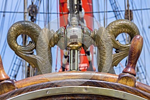 Wooden steering wheel of an old ship