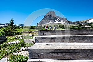Wooden steps leading to Hidden Lake Overlook trail from the Logan Pass Visitor Center at Glacier National Park.