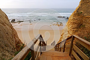 Wooden steps to Praia da Vau, Algarve, Portugal photo