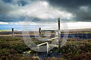 A stile and wire fence, Ilkley moor. Yorkshire