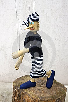 Wooden string operated puppet