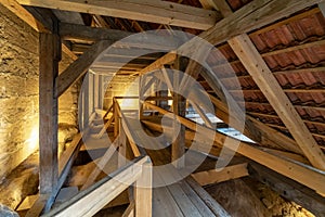 Wooden structures of the attic of an old house