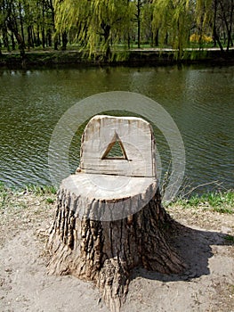 A wooden stump in the park