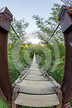 Wooden suspension bridge in Cheile Nerei, Romania