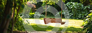 Wooden Swing Hanging From Tree in Park