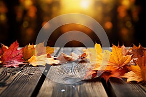 Wooden table adorned with colorful autumn leaves, a seasonal scene photo
